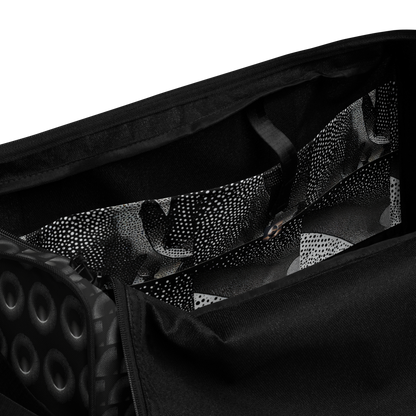 BEATS.CALI duffle bag is built to last. Its robust construction, featuring 100% polyester with black interlining, ensures it can handle the demands of your busiest days. With a generous interior space measuring 22" x 11.5" x 11.5", staying organized has never been easier. Utilize the multiple pockets, including a secure zipper pocket, to keep your essentials within reach.&nbsp; our duffle bag ensures stability with T-piping, providing peace of mind as you navigate daily.