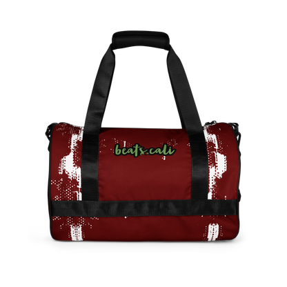 Crafted from durable 100% polyester and featuring sturdy, water-resistant fabric, this gym bag from beats.cali. combines fun with functionality. Perfect for stashing your workout essentials, it comes equipped with plenty of pockets to keep you organized. The fabric weight of 9.91 oz/yd² (336 g/m²) ensures durability.